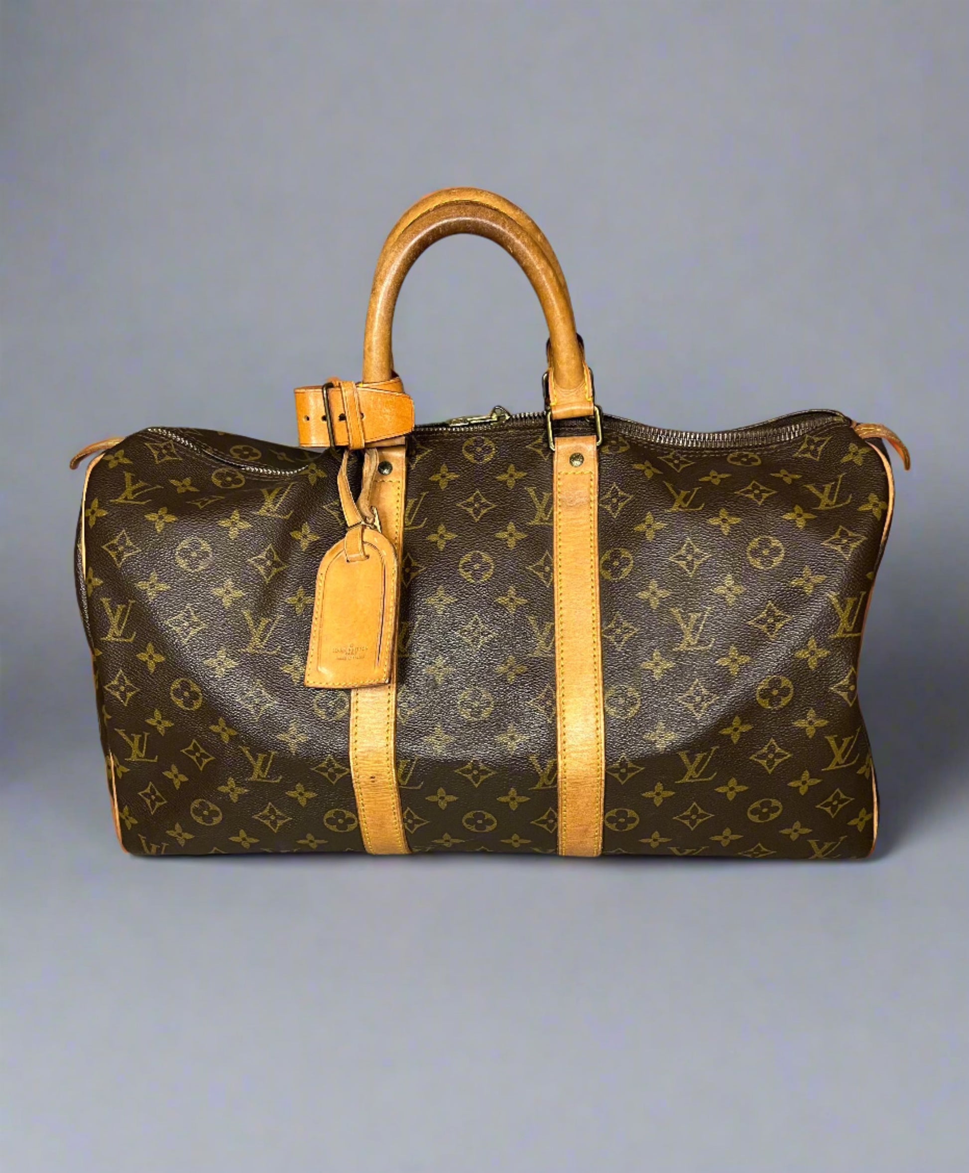 1995 Louis Vuitton Brown Monogram Coated Canvas and Vachetta Vintage  Keepall 45 at 1stDibs